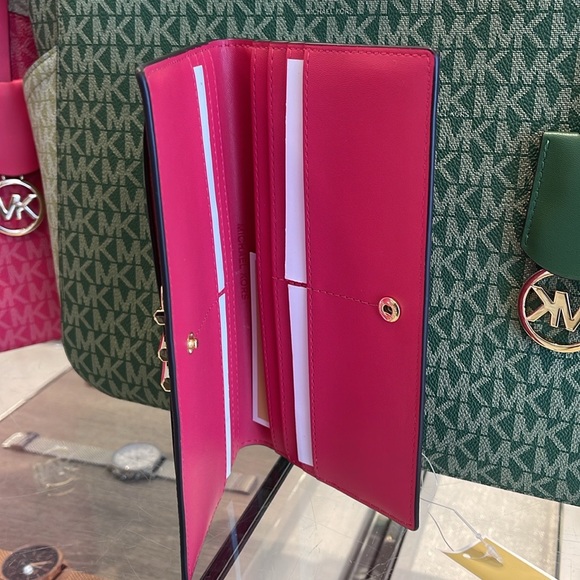 MICHAEL KORS
Reed Large Snap Signature Wallet
Electric Pink NWT - Picture 14 of 16